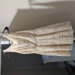 Fit and flare gold dress